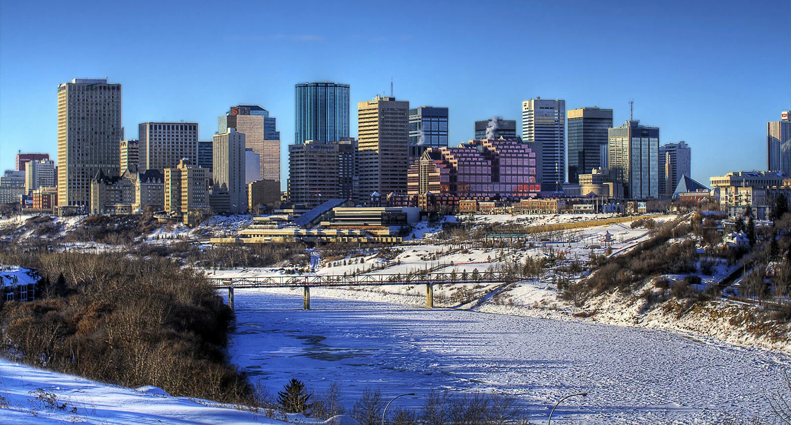 Edmonton buildings with snow covered ground in the foreground